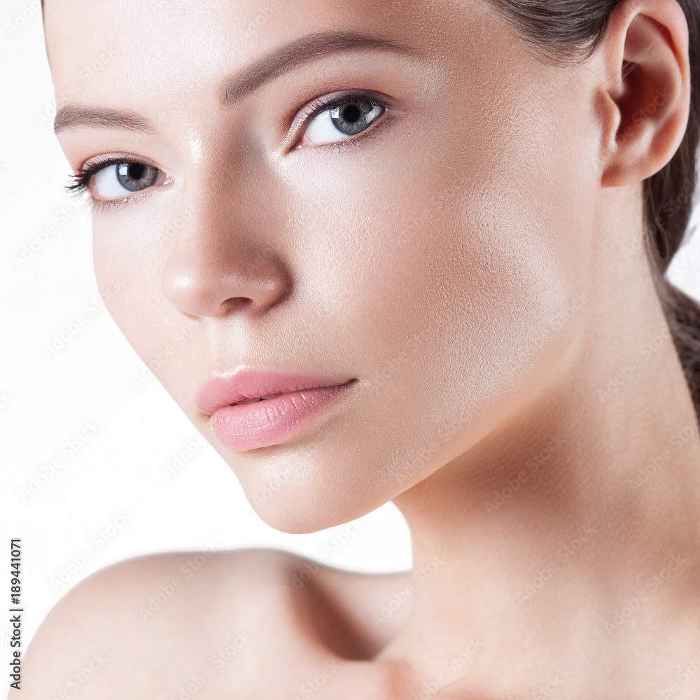 Young beautiful woman with clean perfect skin close-up Young beautiful woman with clean perfect skin close-up