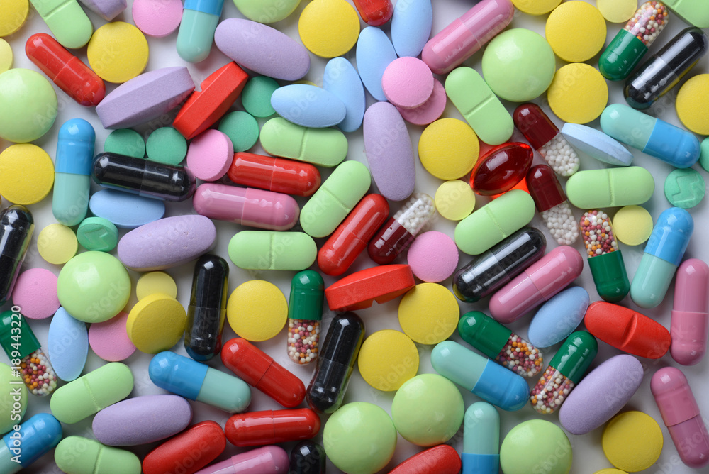 Pharmacy theme. Multicolored Isolated Pills and Capsules Pharmacy theme. Multicolored Isolated Pills and Capsules