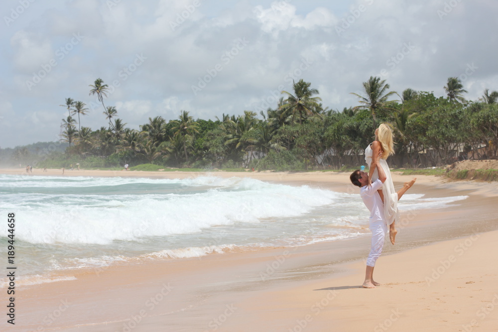honeymoon.couple on the beach. family vacation honeymoon.couple on the beach. family vacation
