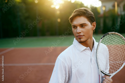 Sports Man Before Playing Tennis On Court.