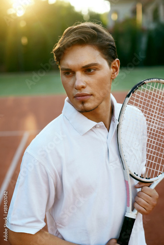 Sports Man Before Playing Tennis On Court.