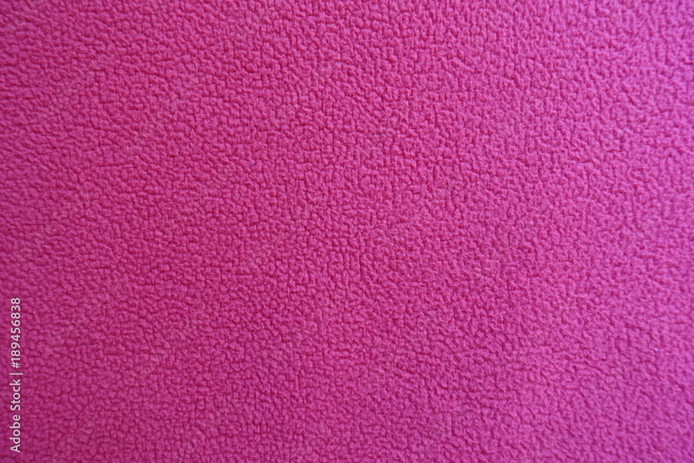 Deep pink polar fleece fabric from above Deep pink polar fleece fabric from above
