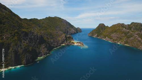 Tropical islands, aerial view. Aerial view: sea and the tropical islands. Tropical bay in El Nido. Archipelago El Nido.Sandy beaches of the wild islands. Philippines National Marine Park. Seascape