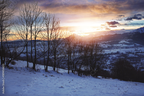 beautiful sunrise on a mountain slope © ambrozinio