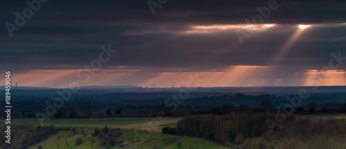 Stormy Sunset over Fawley Refinery showing the panoramic skyline around Southampton from Beacon Hill on the South Downs