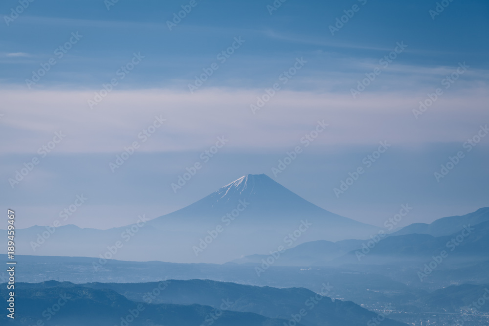 Mountain Fuji with morning mist in spring season