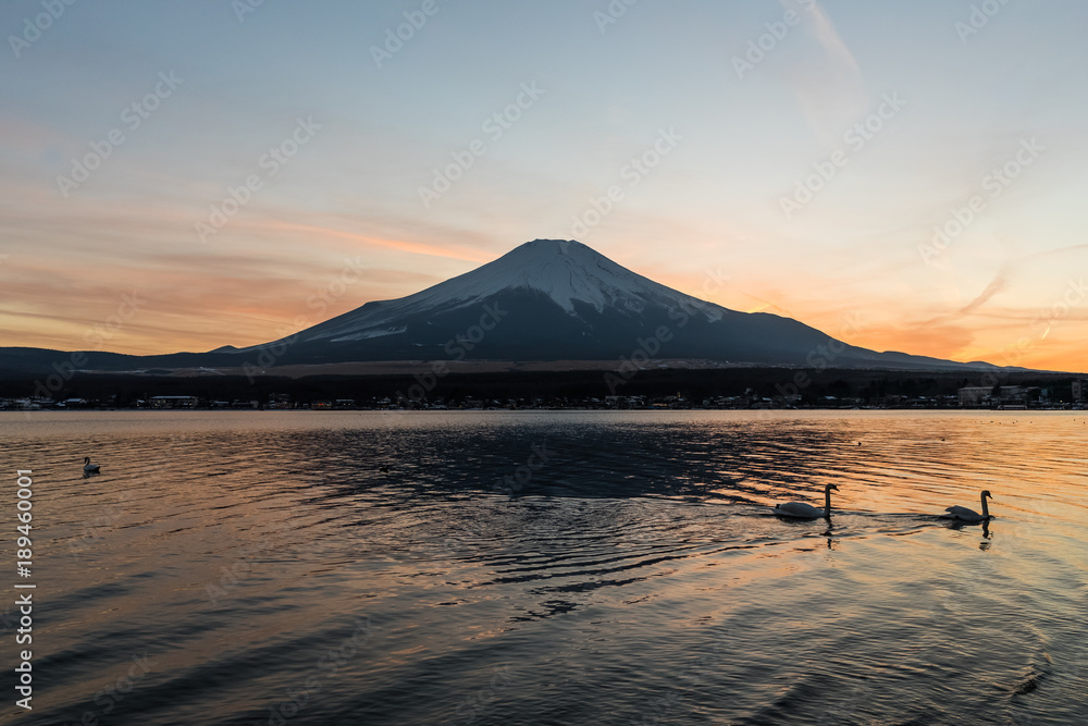 View of Mount Fuji and Lake Yamanakako in winter evening. Lake Yamanakako is the largest of the Fuji Five Lakes.