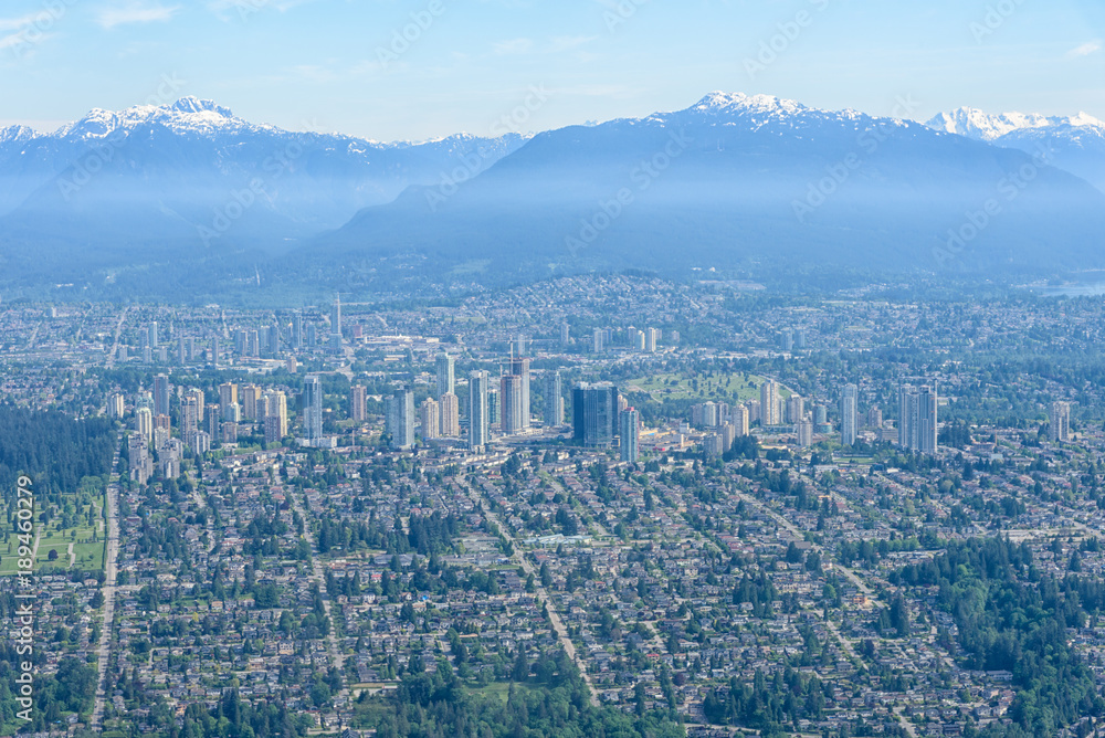 Aerial view of Vancouver with snow-capped mountain, British Columbia, Canada