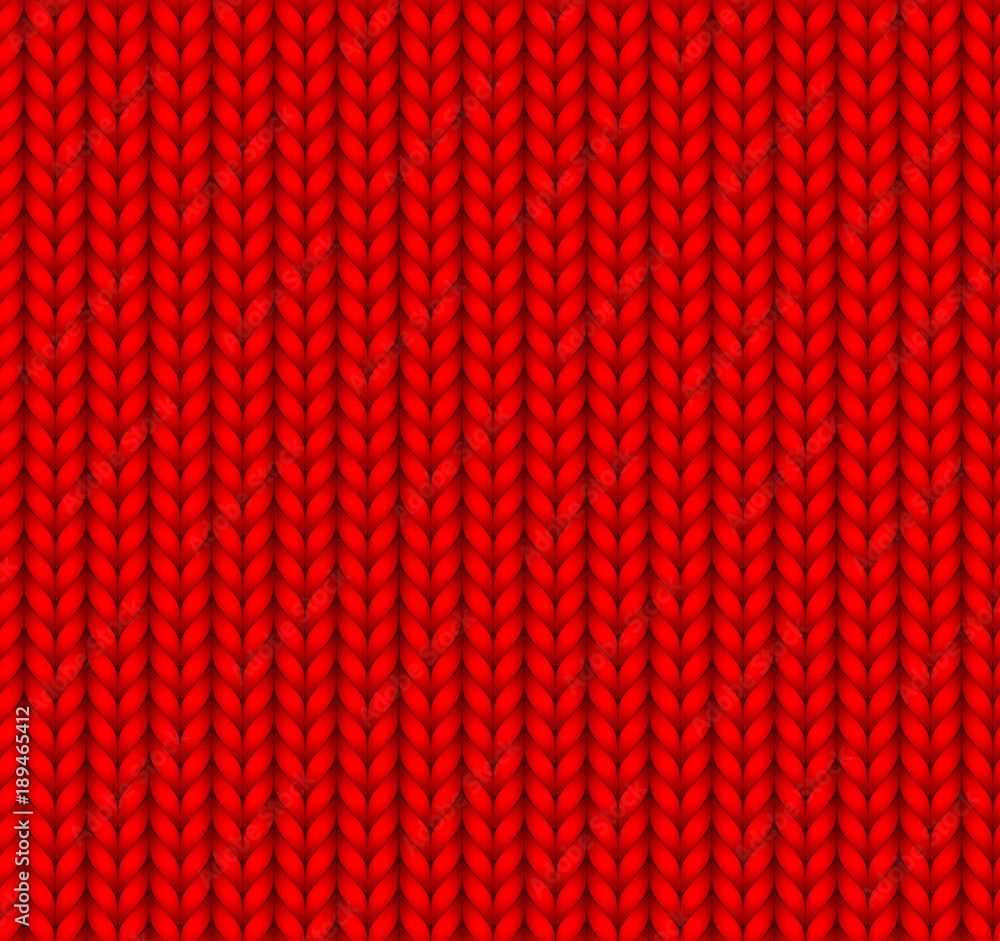 Seamless knitted texture of red color. The knitting technique is a