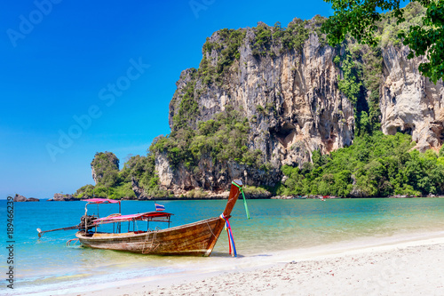 Traditional longtail boats, tropical sea