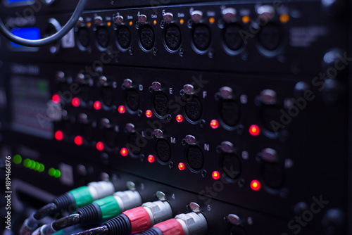 Sound system , Sound cable on  studio in plug.  wires plugged into sound amplifiers