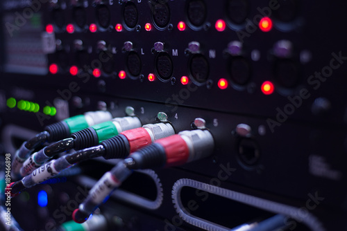 Sound system , Sound cable on  studio in plug.  wires plugged into sound amplifiers