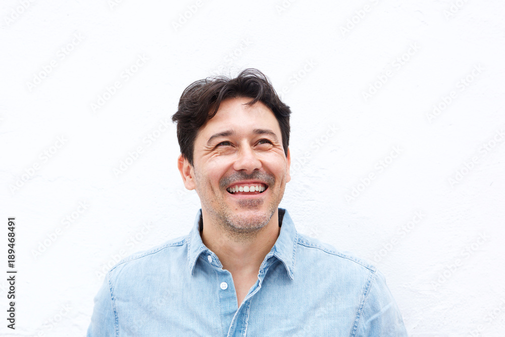 happy older man looking away and smiling isolated on white background happy older man looking away and smiling isolated on white background