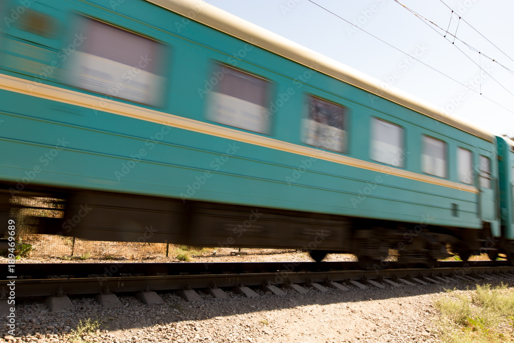 Fototapeta premium Train wagons in motion as a background