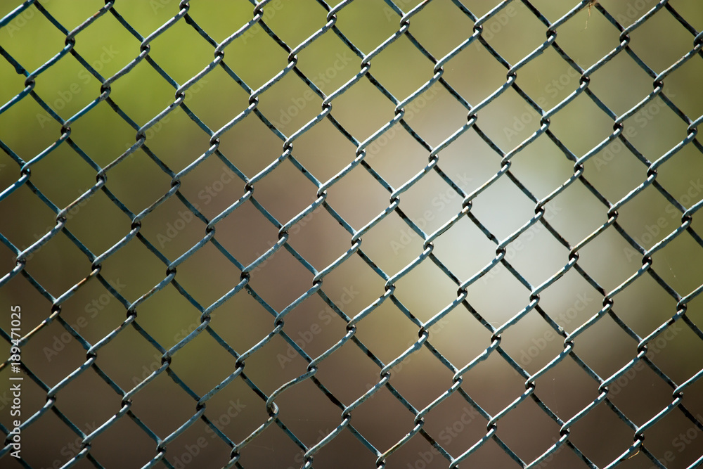 Metal mesh on the fence as a background Metal mesh on the fence as a background