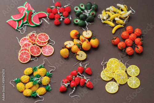 Miniature Fake Polymer Clay Fruits on Brown Background. , Polymer Clay Earrings, Plastic Summer Fruits photo