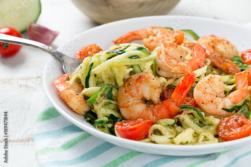 Delicious zucchini noodles  with cherry tomato and prawns