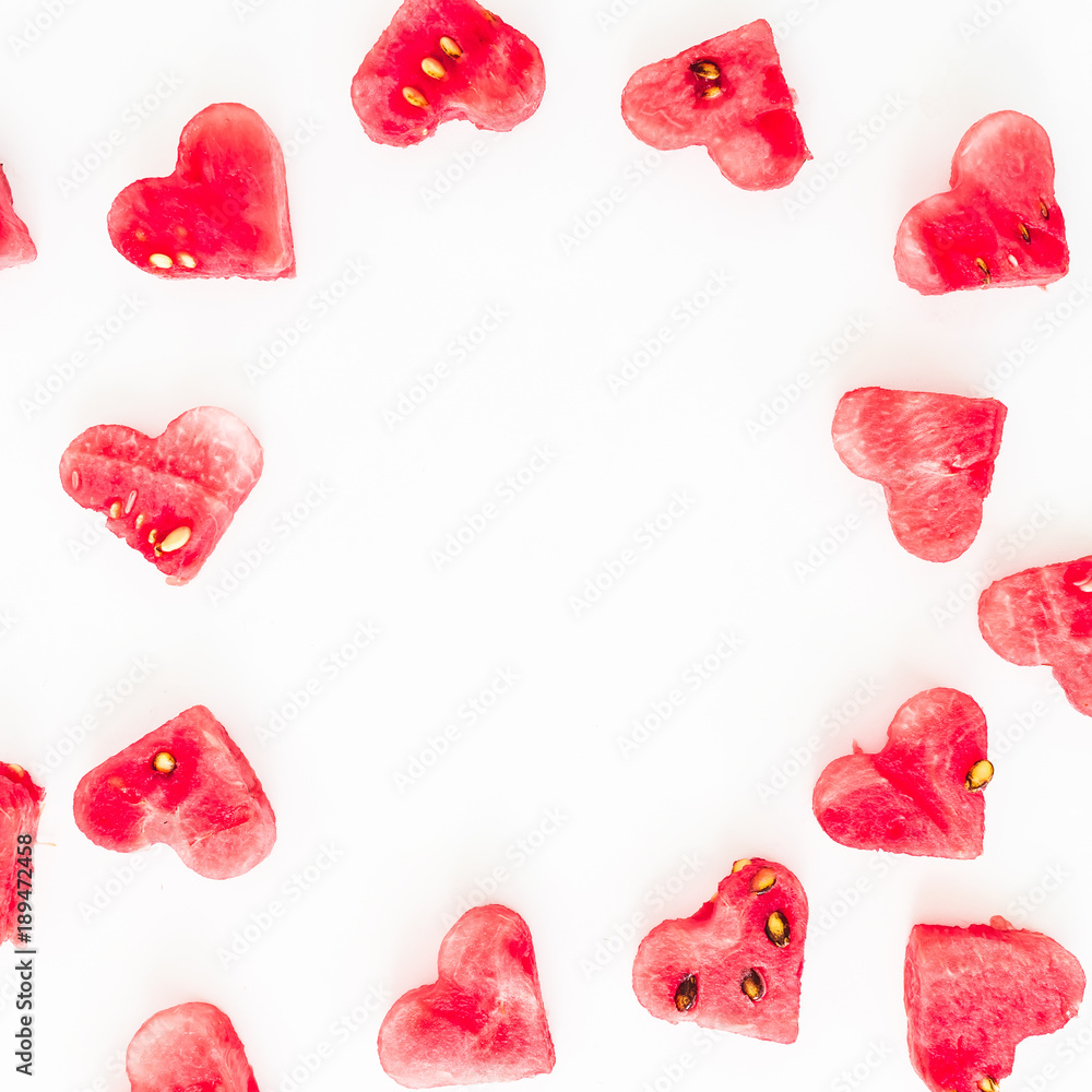 Valentine's day heart made of watermelon on white background. Flat lay, top view. Frame background Valentine's day heart made of watermelon on white background. Flat lay, top view. Frame background