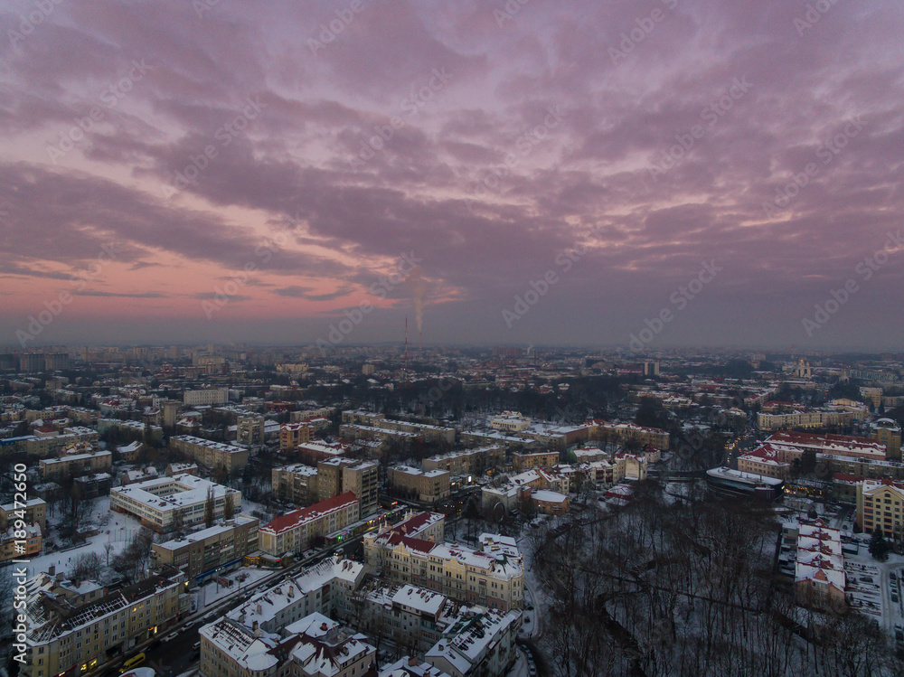 Aerial: Cityscape of Kaliningrad at sunset, winter time