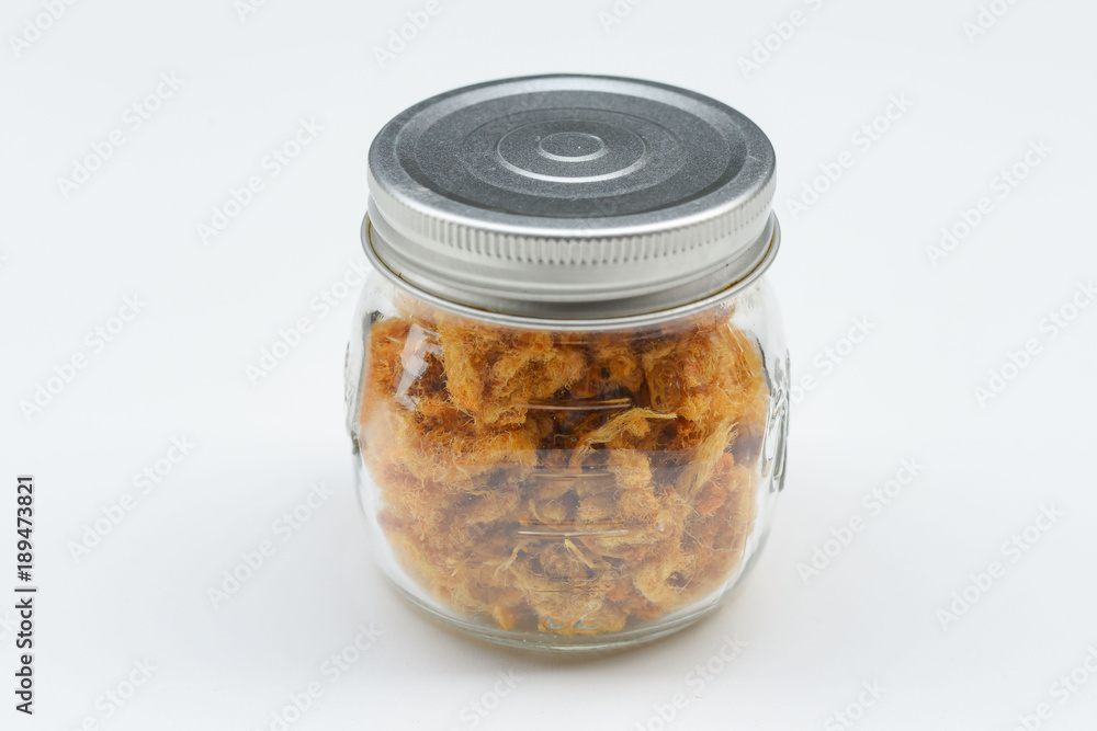 dried shredded pork in a bottle of white ground
dried shredded pork in a bottle of white ground