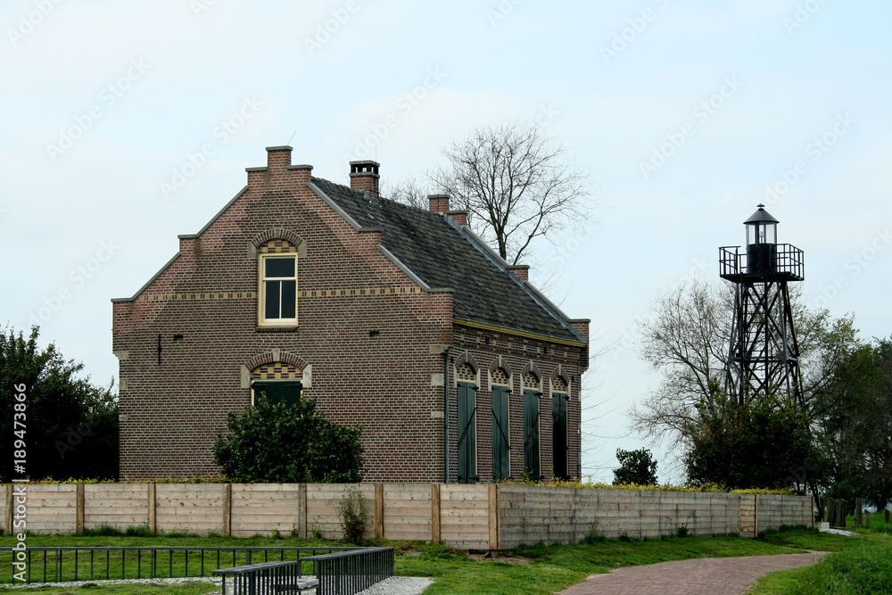 Former dwelling of the lighthouse keeper on the former island of Schokland Former dwelling of the lighthouse keeper on the former island of Schokland