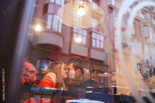 Couple in love drinking coffee in cafe