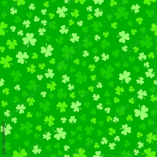 Bright green clover leaves, seamless pattern. Minimal vector background. Flat illustration of clover icon. St. Patrick's background.