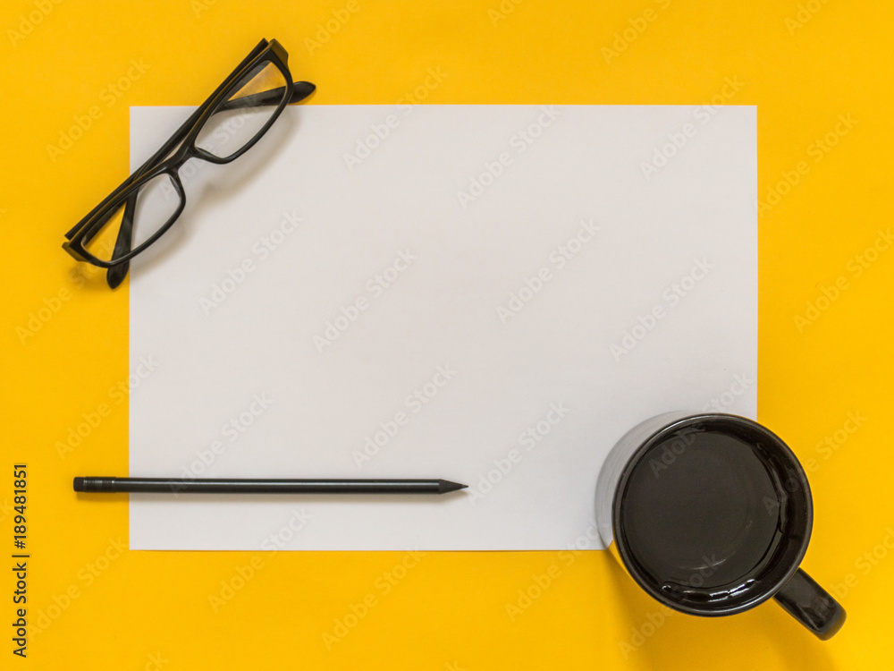 Flat lay black business accessories on yellow background with blank space for text. Top view. Copy space. Flat lay black business accessories on yellow background with blank space for text. Top view. Copy space.