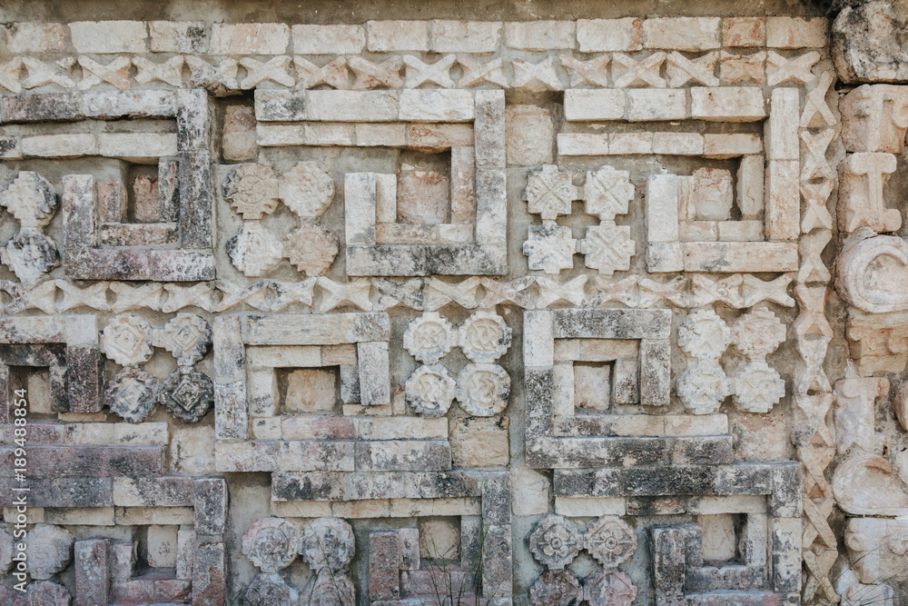 mayan stone carvings in Uxmal Mexico 