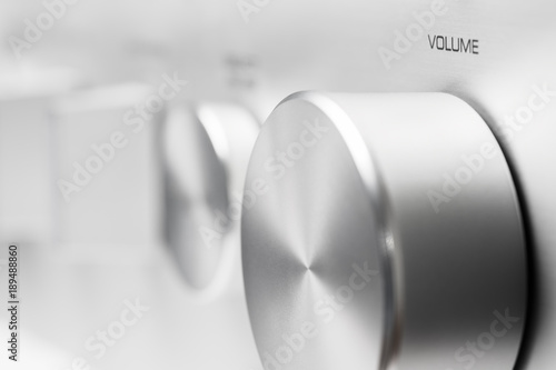 aluminium silver volume knob, amplifier front panel aluminium texture photo