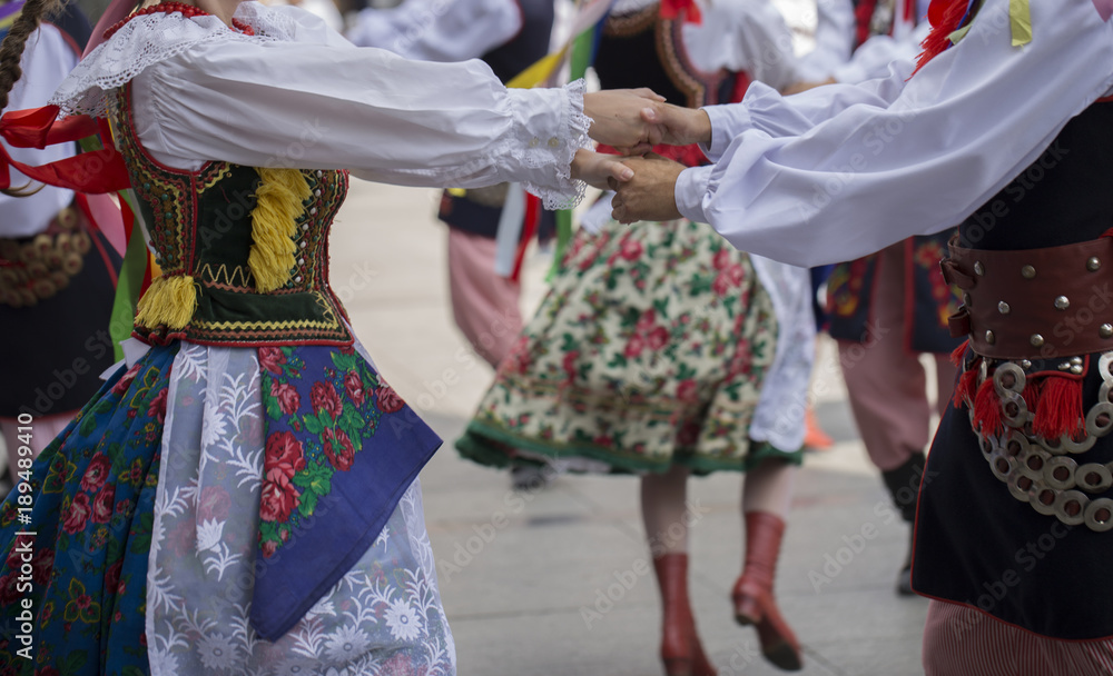 Polish folk dance goup with traditional costume