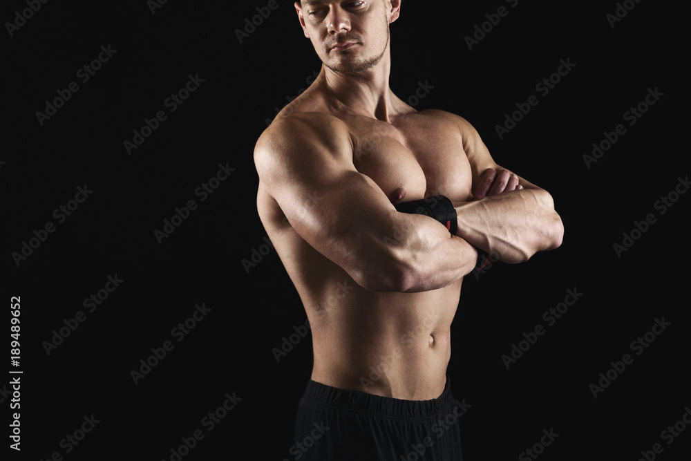 Fototapeta premium Strong athletic man showes naked muscular body