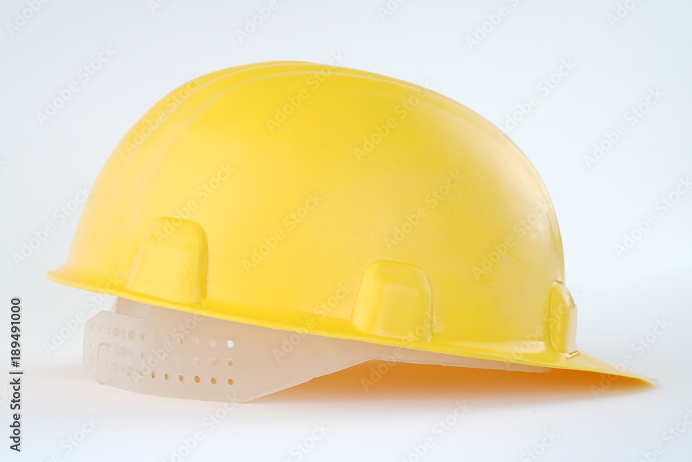 Fototapeta premium yellow construction helmet