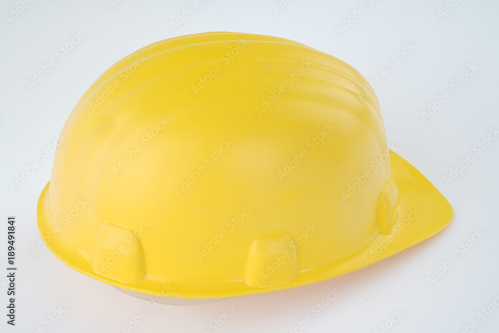 Fototapeta premium yellow construction helmet
