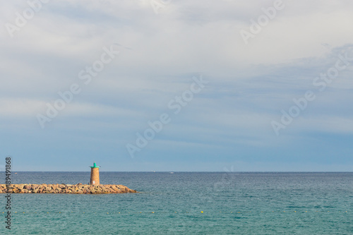 A small lighthouse of the French city Mandelieu-la-Napoule in the Mediterranean sea in Europe
