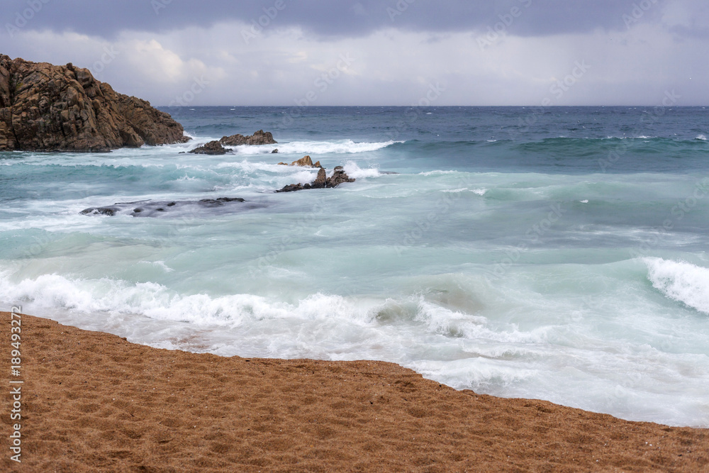 Mediterranean beach in Costa Brava, stormy day.Blanes,Catalonia,Spain.