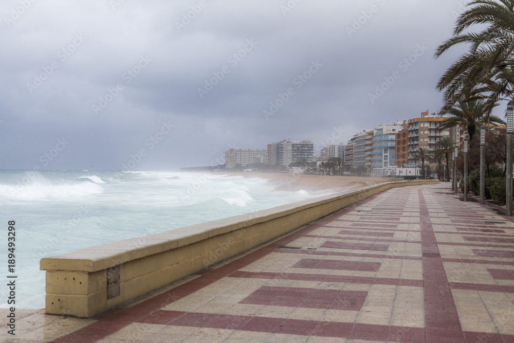 Mediterranean beach winter storm day in Costa Brava,Blanes,Catalonia,Spain.