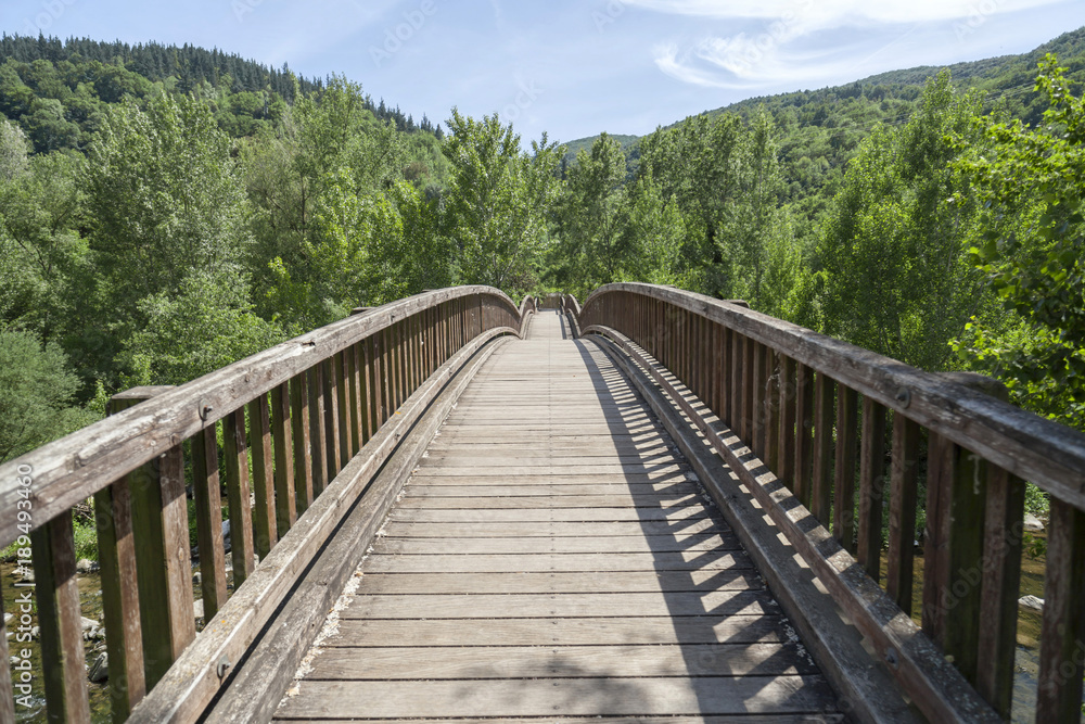 Landscape with wooden bridge in Garrotxa region,Castellfollit de la Roca,Catalonia,Spain.