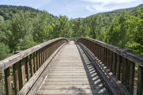 Landscape with wooden bridge in Garrotxa region Castellfollit de la Roca Catalonia Spain.