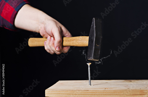 hammer blow on the screw for a stupid master