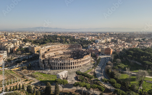 Fotografie Aerial view of Colosseum on a sunny day. Rome, Italy