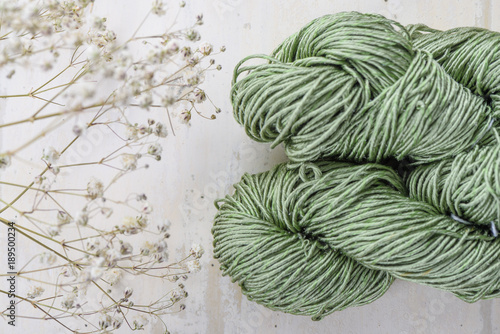 Precious silk yarn on a white table
