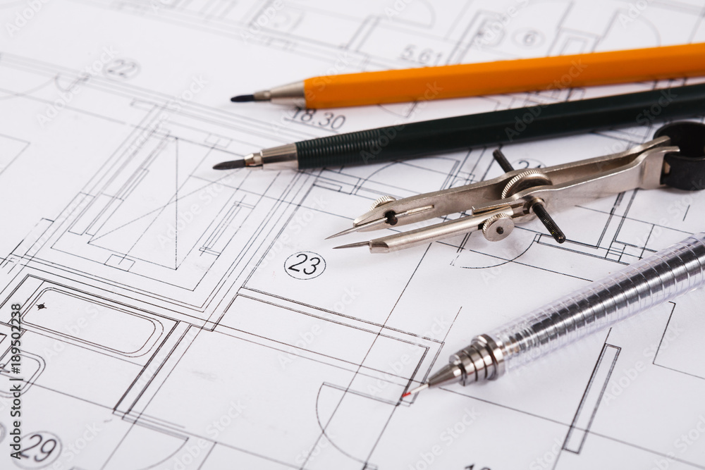 Architectural project, engineering tools on table. Architectural project, engineering tools on table.