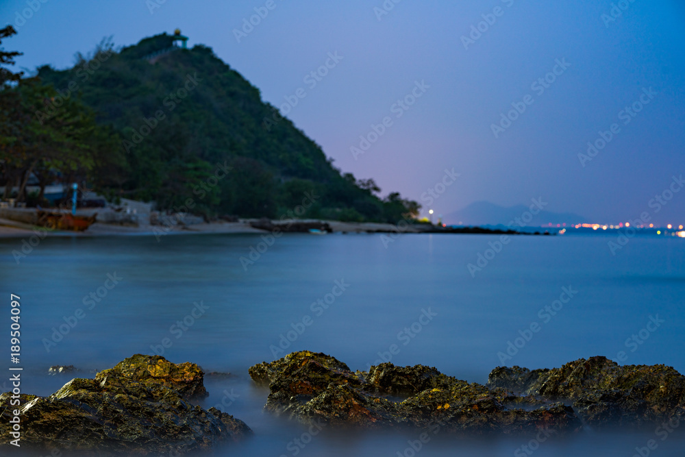 View of mountain and blue sky at sea coast. View from a rocky cliff on the Black Sea coast.