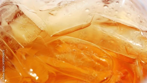 Tea with ice in a glass