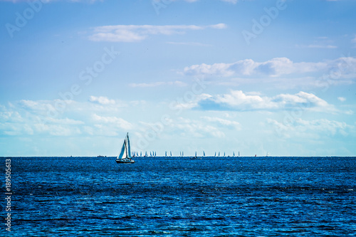 Sailing boats on the sea and blue sky.