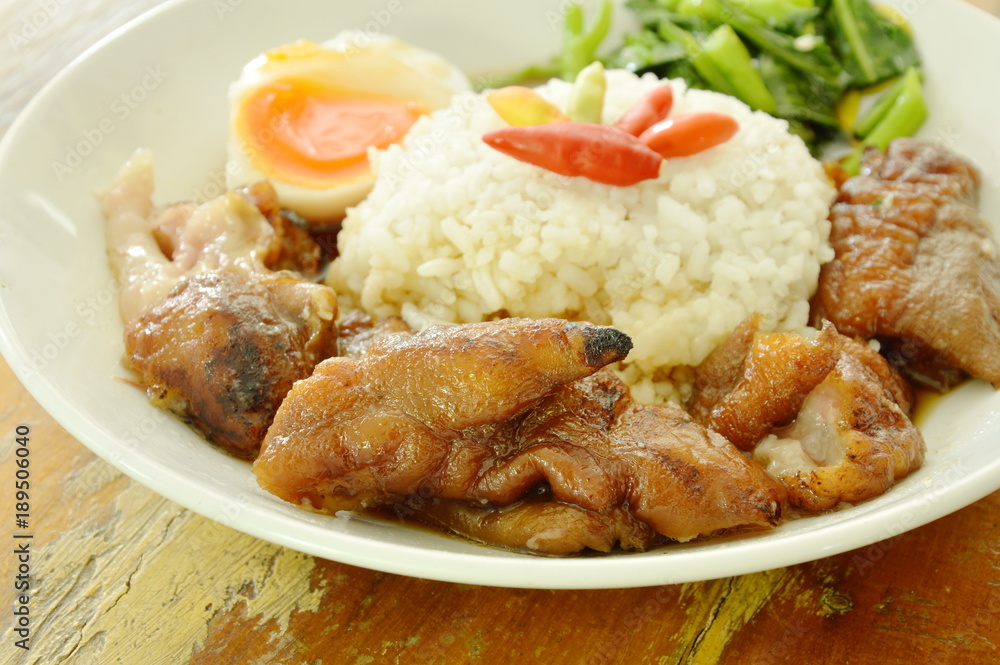 pork trotters stew and boiled egg with rice on plate pork trotters stew and boiled egg with rice on plate