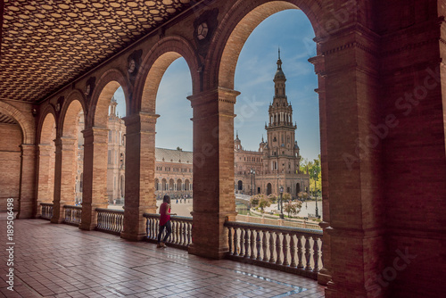 Young woman latina tourist visiting Plaza Espa  a in Seville