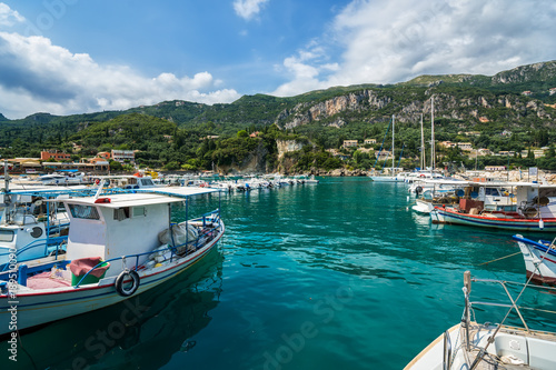 Yachts, boats and sailor ships parking in Paleokastritsa bay, Corfu, Greece. © Media_Works