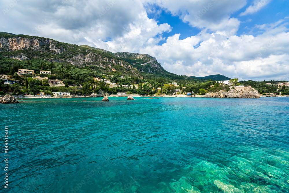 Emerald water of Ionian sea in Paleokastritsa bay Corfu, Greece.